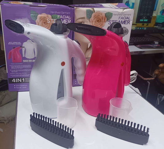 Handheld garment or facial steamer