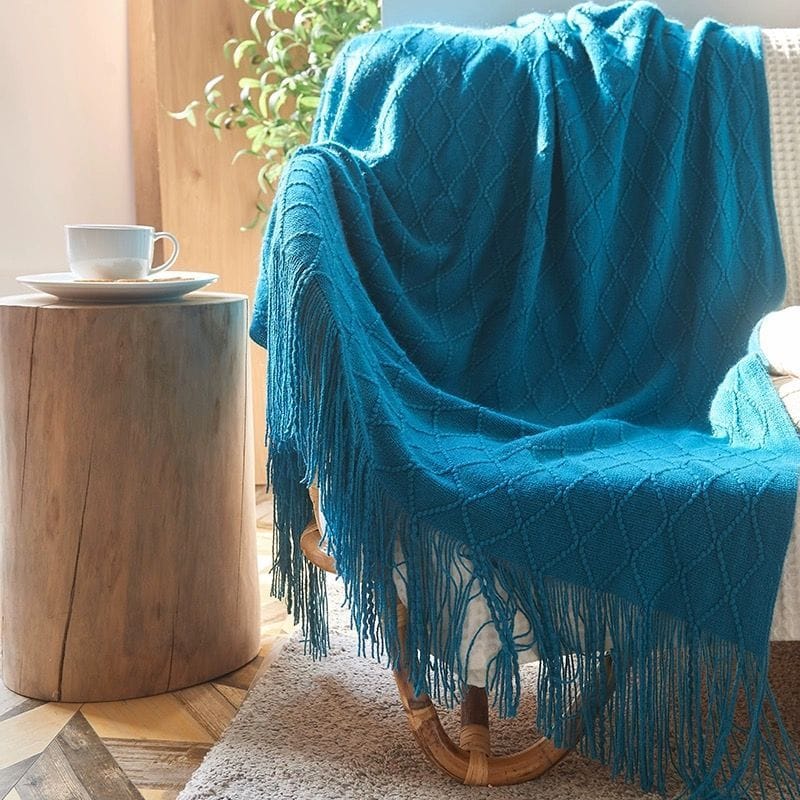 Knitted throw blankets with tassel