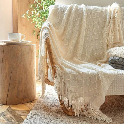 Knitted throw blankets with tassel