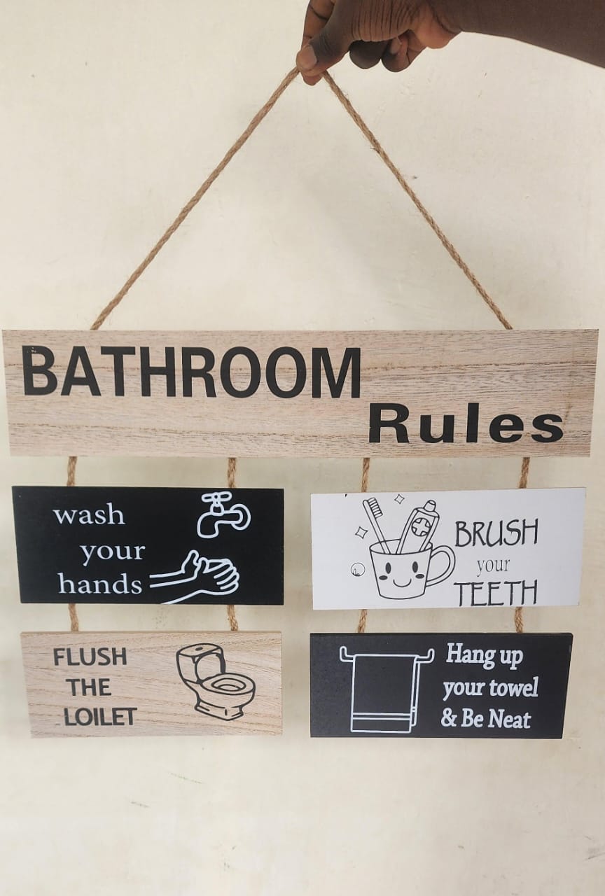 Wooden bathroom rules hanging