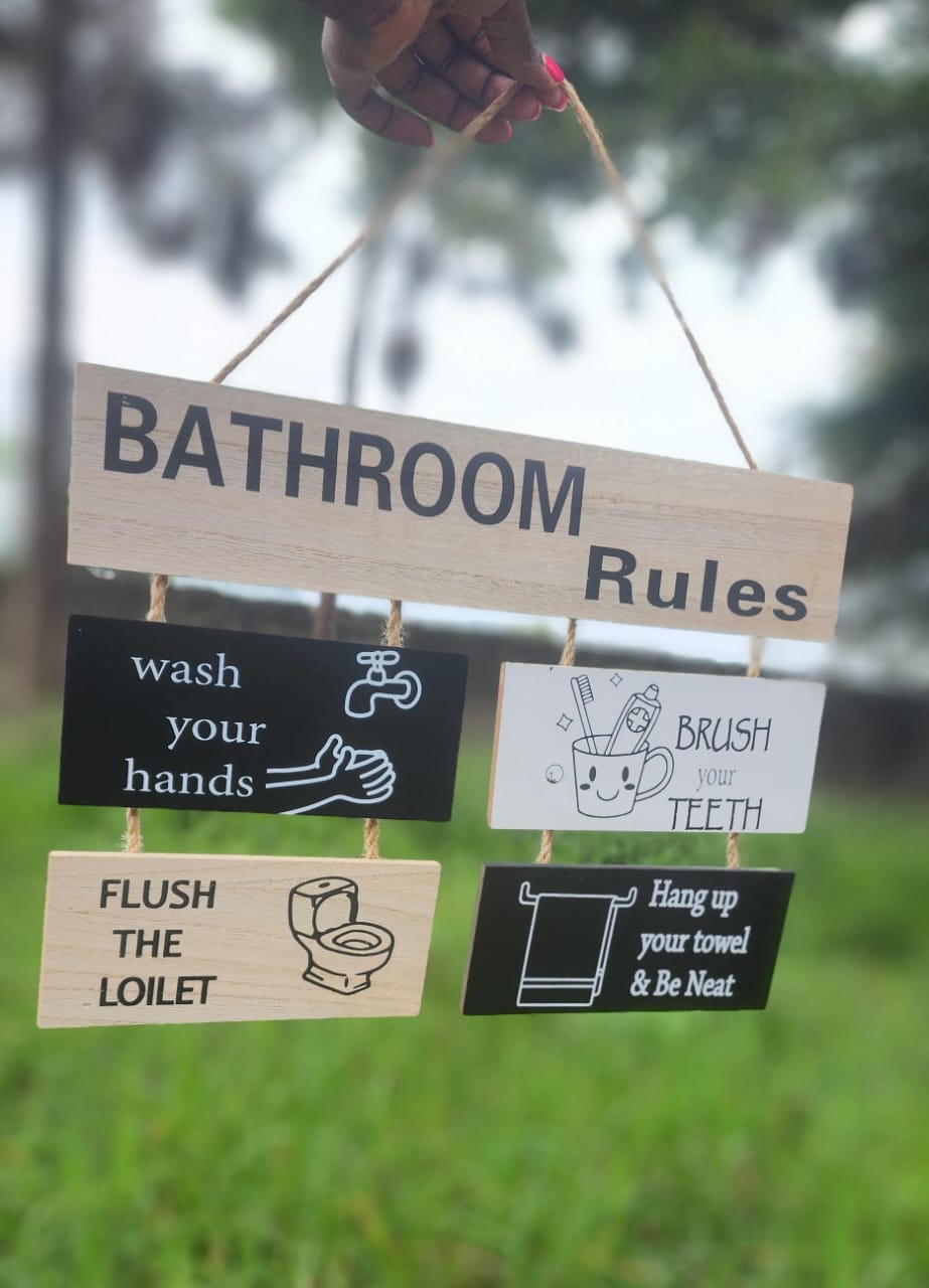 Wooden bathroom rules hanging