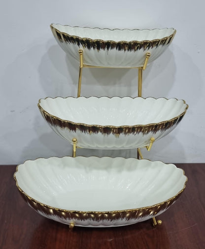 Ceramic fruit bowls on metal rack