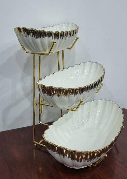 Ceramic fruit bowls on metal rack