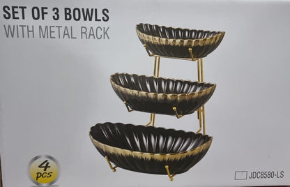 Ceramic fruit bowls on metal rack