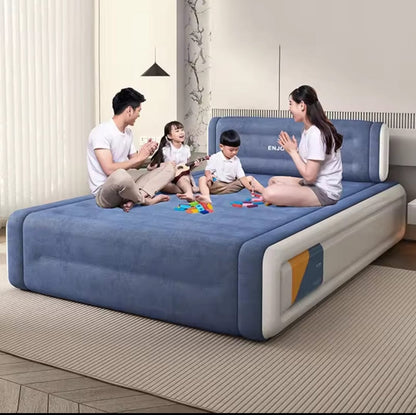 Inflatable airbed with headboard