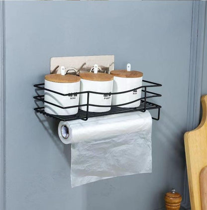 Wrought iron wall mounted storage rack .